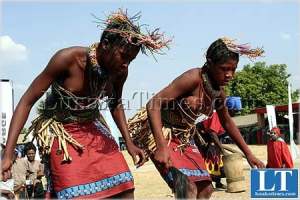 Initiates during to traditional music after their initiation ceremony Initiates during to traditional music after their initiation ceremony