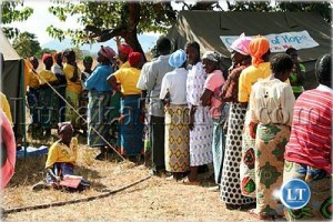 Women queue up for voluntary counseling and testing during the commemoration of VCT day in Chipata
